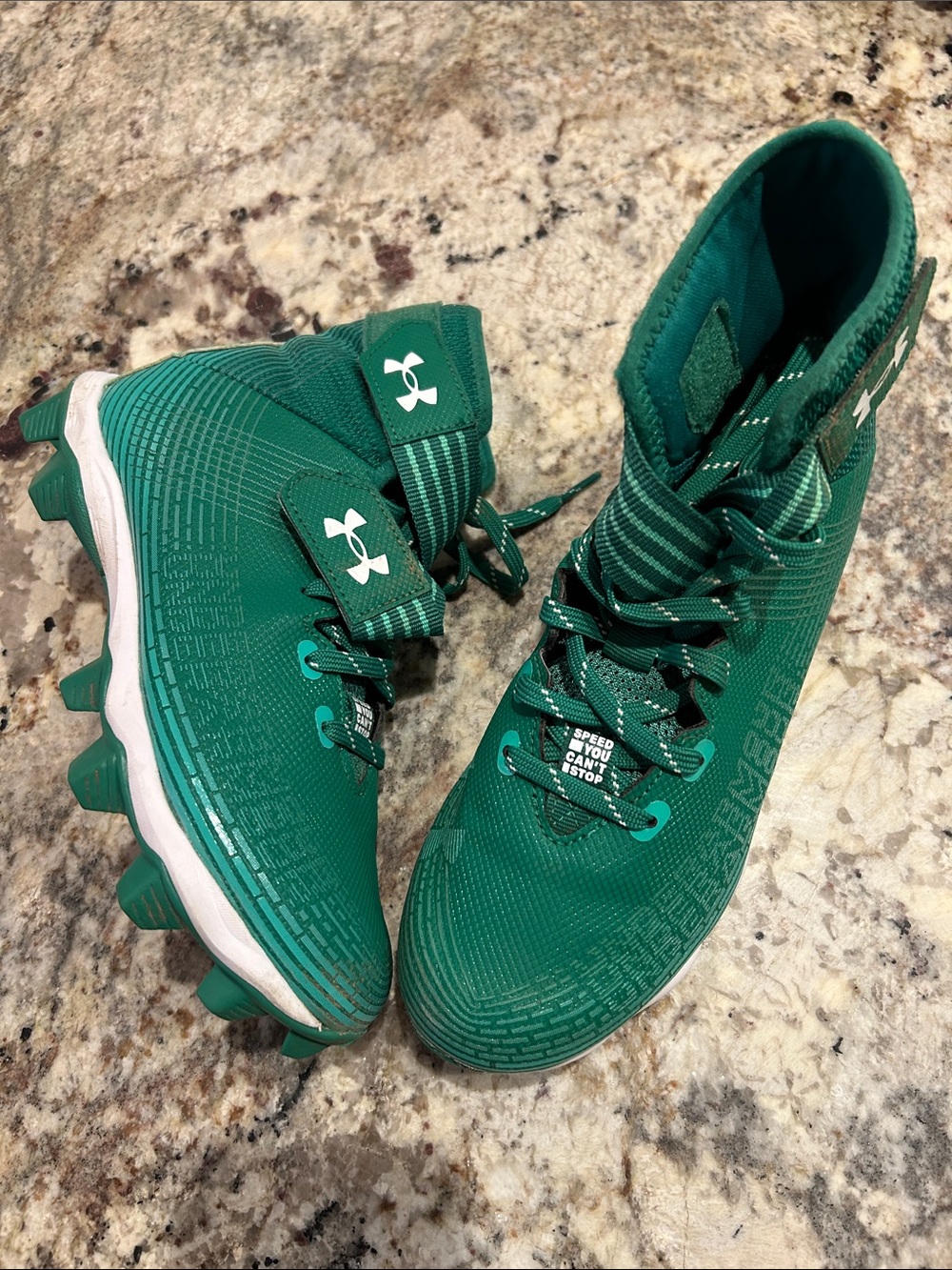 Under Armour Kids Green Cleats with White Midsole Accents